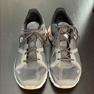 Lightly worn On clouds- great condition gray and pink.